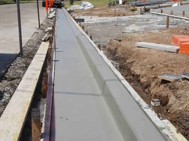 Excavated verge with new kerb and gutter